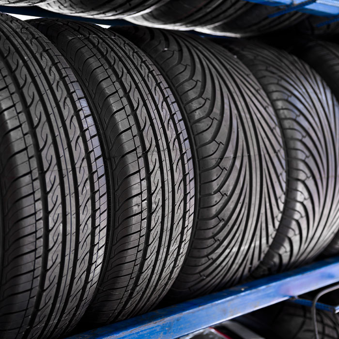 Close up new tyres on shelve in tire shop