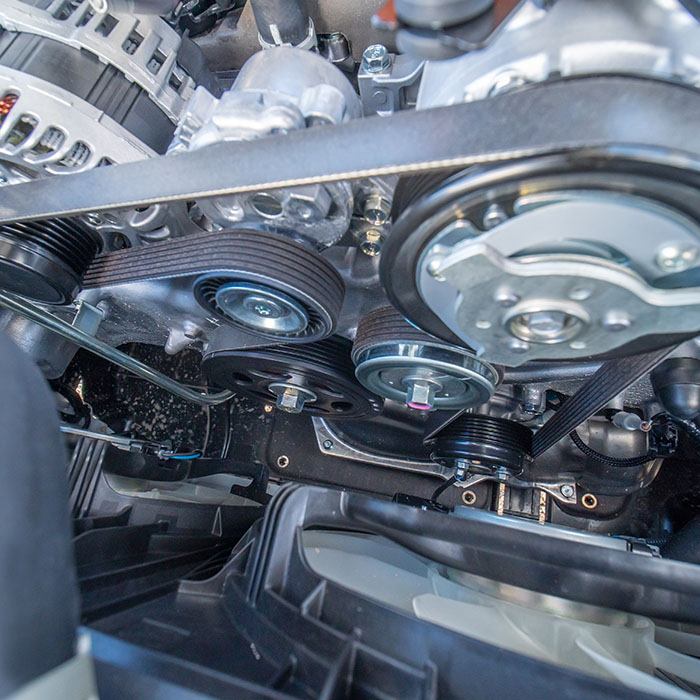 Engine block timing cover with pulley water pump, rubber belt, tubes and hoses